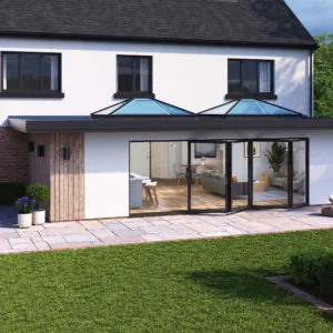 Two elegant Korniche Roof Lanterns flood a modern home extension with natural light.