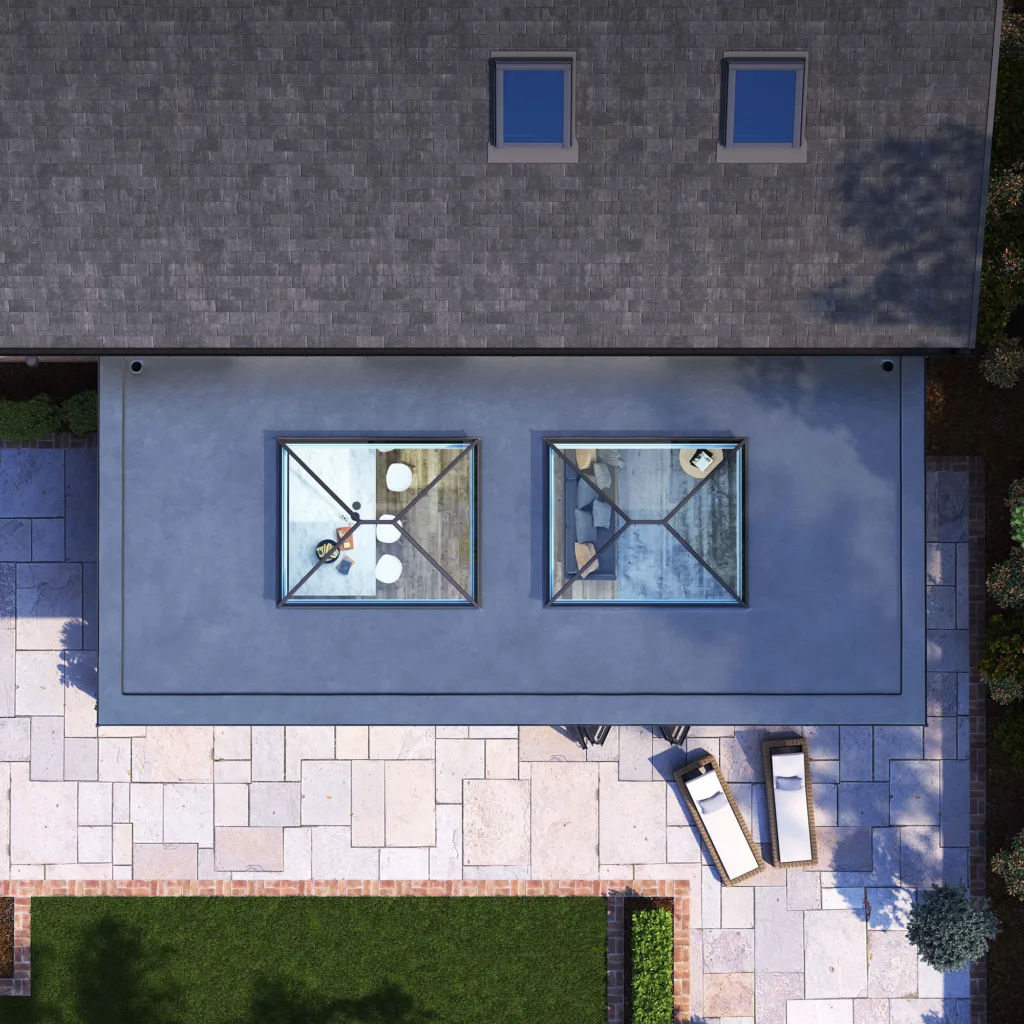 Aerial view of two Korniche Roof Lanterns installed on a flat roof extension, providing a top-down perspective of their placement.